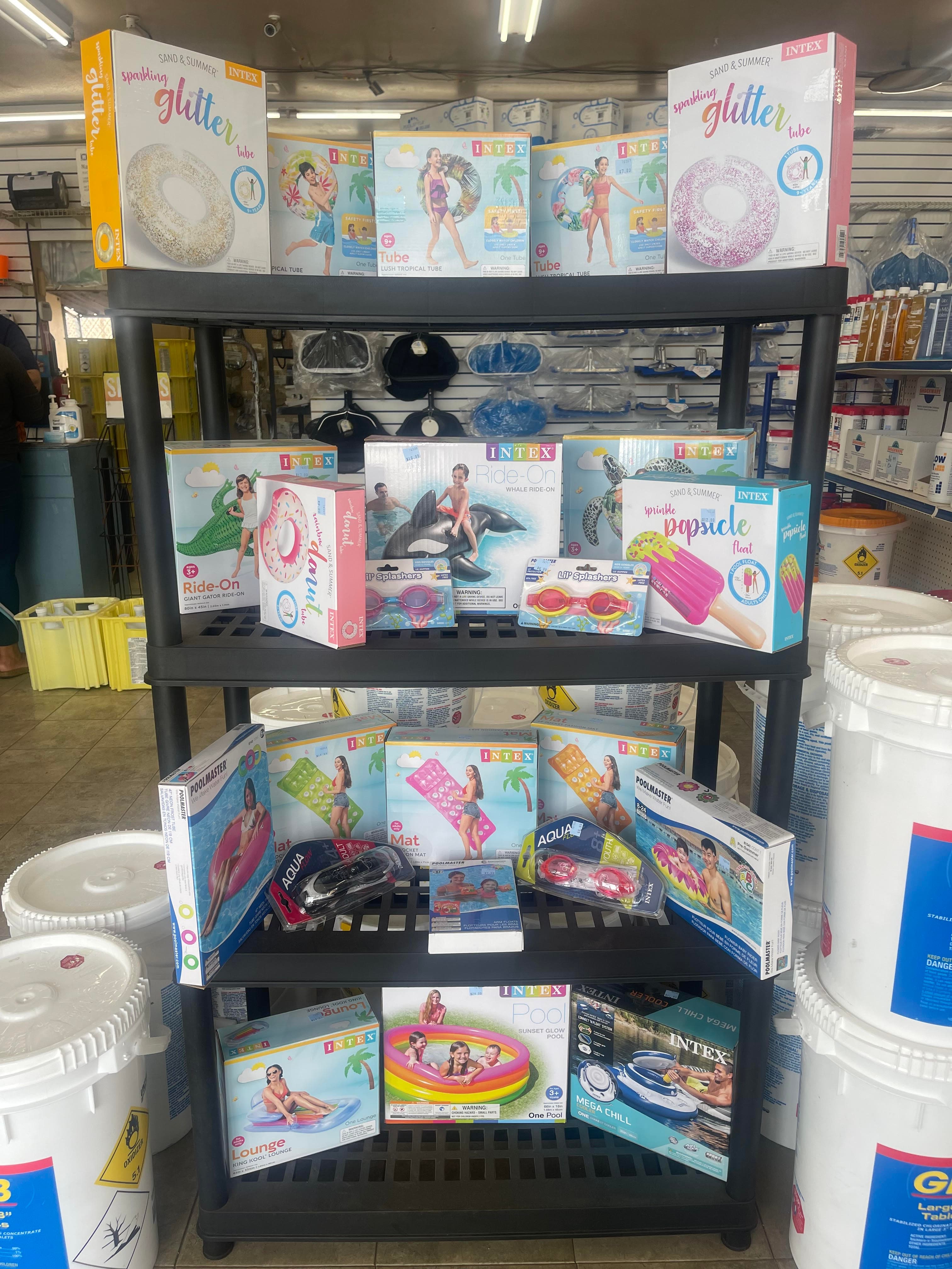 Swimming pool chemicals and cleaning products on shelves